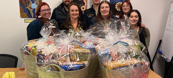 Anchor homelessness team receiving donated hampers
